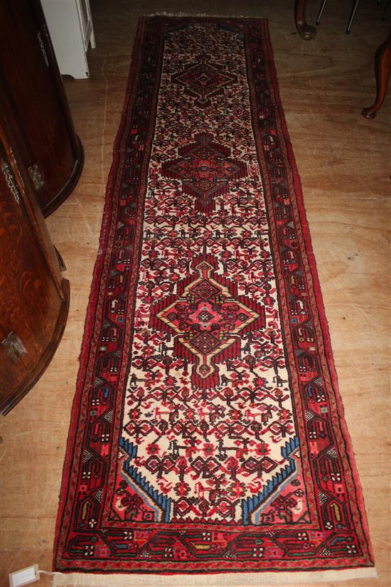 Persian red woollen runner